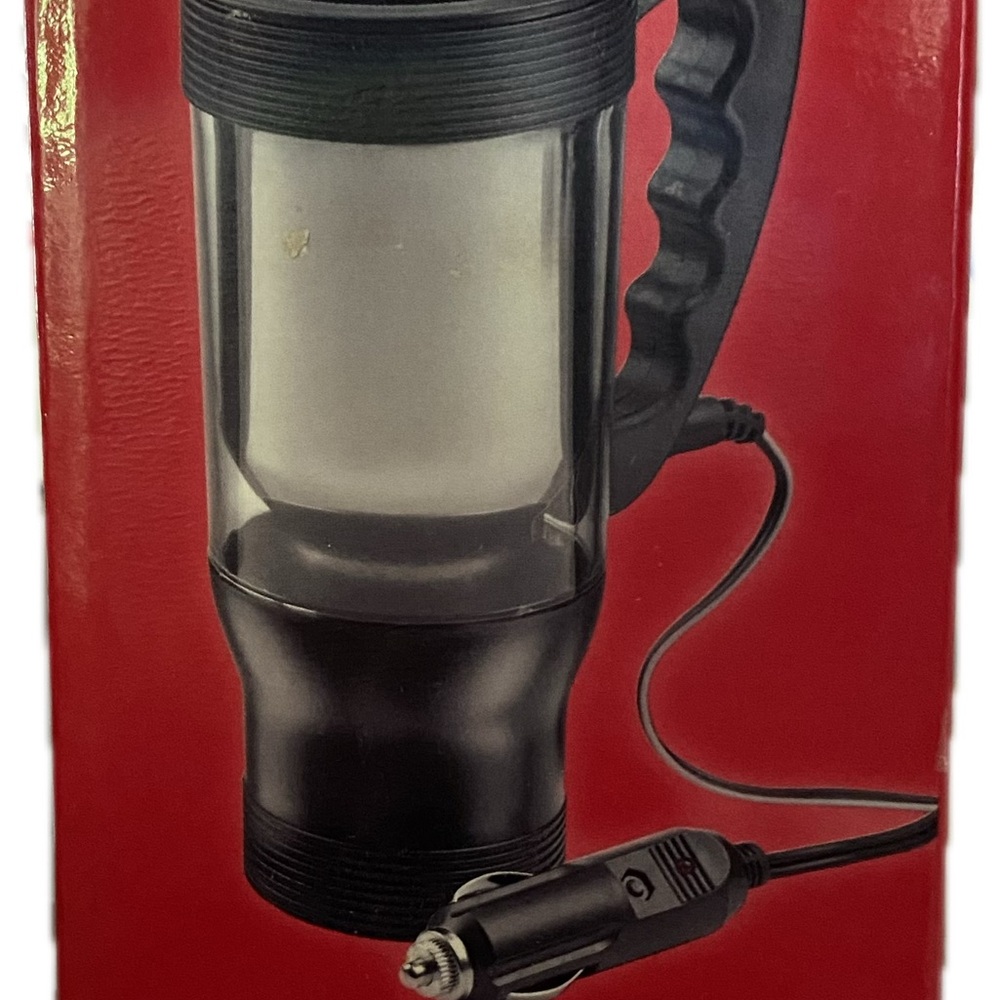 Auto heat travel mug